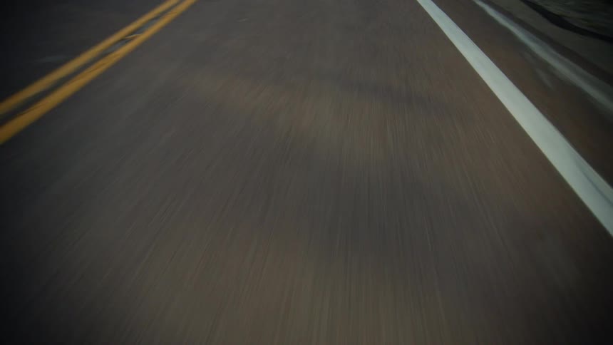 The winding road is near the hills