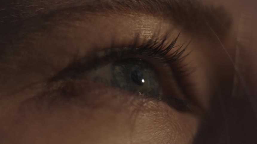 Person blinks their eye