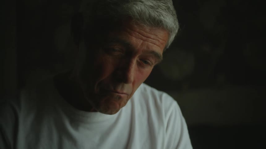 A man poses while deep in thought