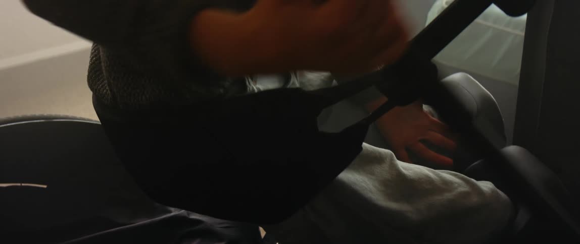 Person uses sling to move from chair