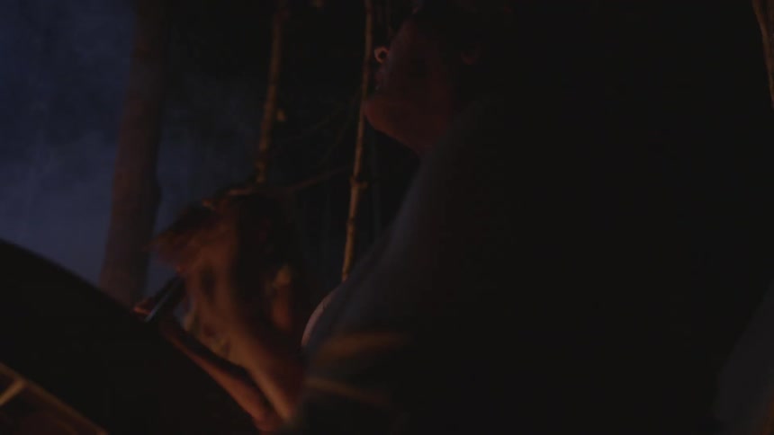 Tribal people playing instruments and singing