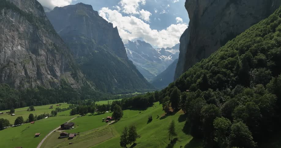 Aerial view of a small european town on a valley in the mountains at daytime