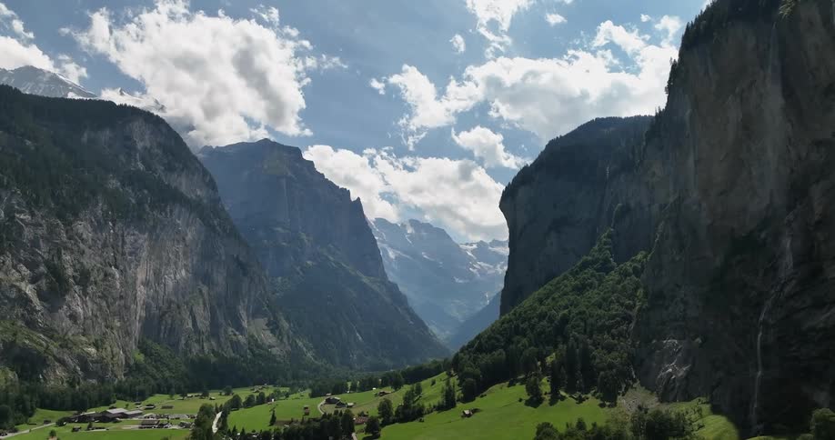 Aerial view of a small european town on a valley in the mountains at daytime