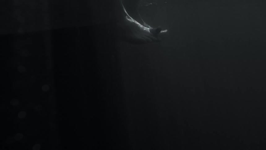 Feet moving under water