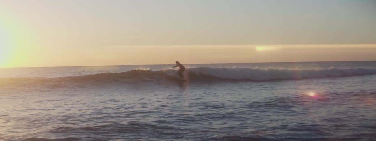 Two men are surfing