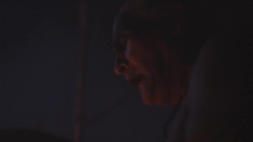 A man sings at night