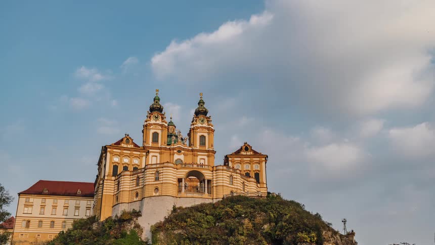 Exterior view of melk abbey on a rocky outcrop