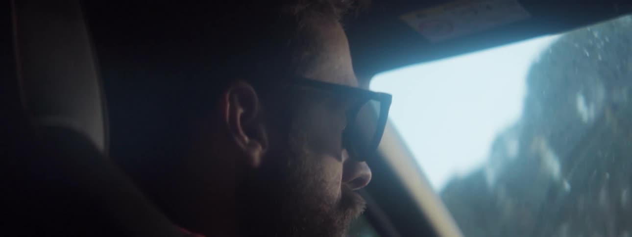 A man is driving the car