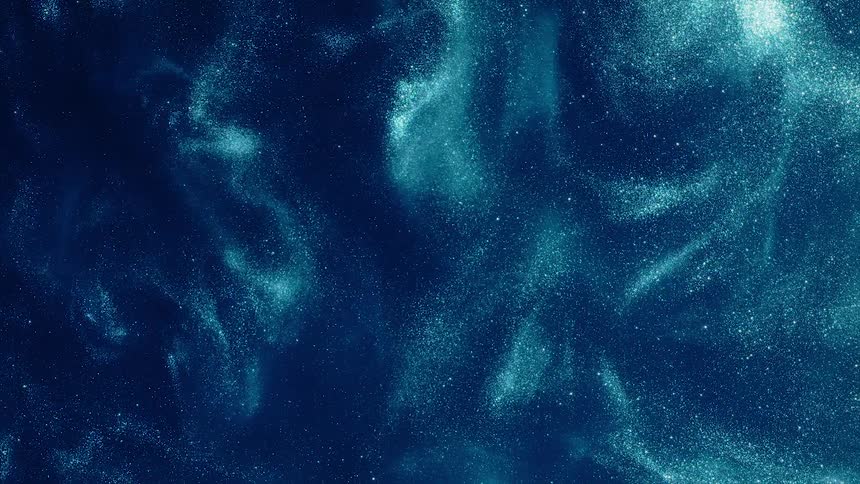 Shimmering flowing waves of colorful blue particles flowing out of a dark blue background