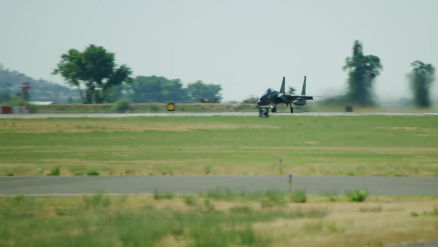 A F-15 fighter jet takes off on an air patrol of the national airspace