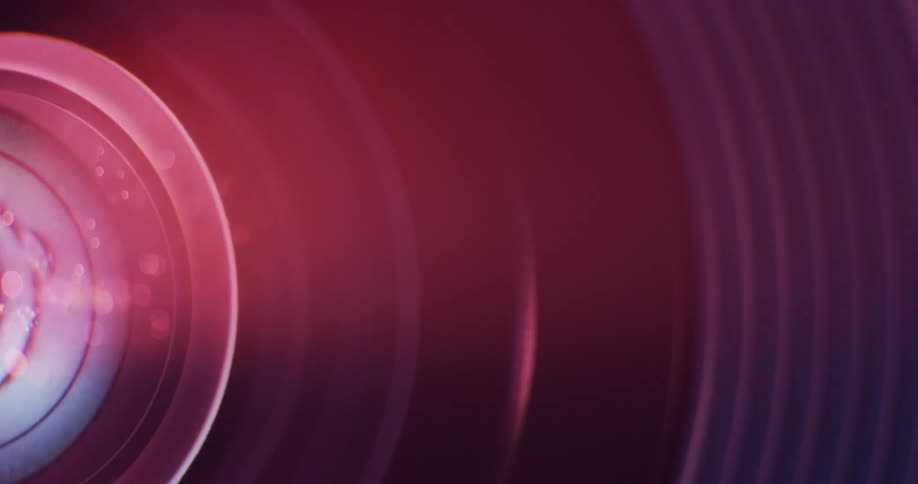 Abstract footage of a bright light with droplets of water and mist