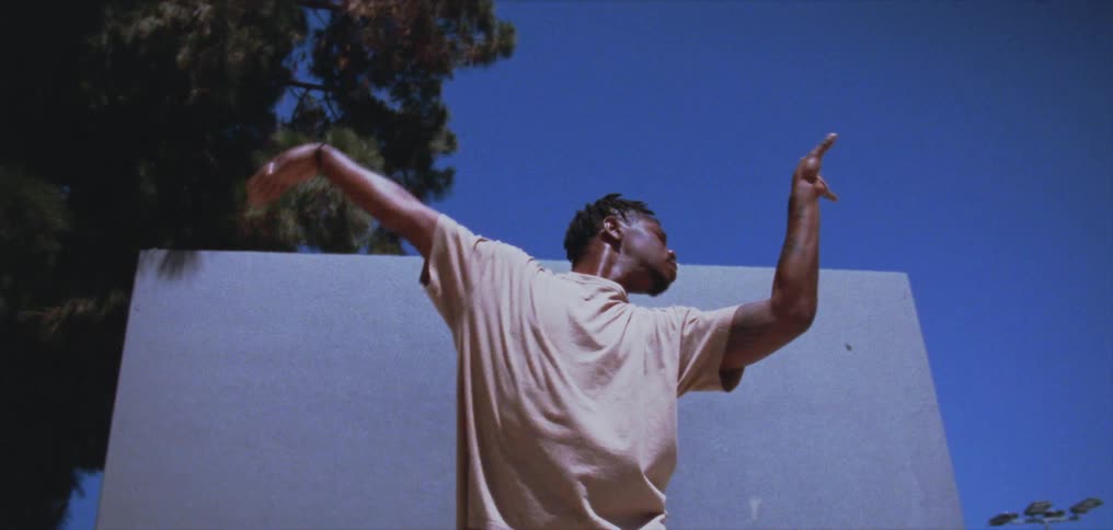 A man dancing outdoors