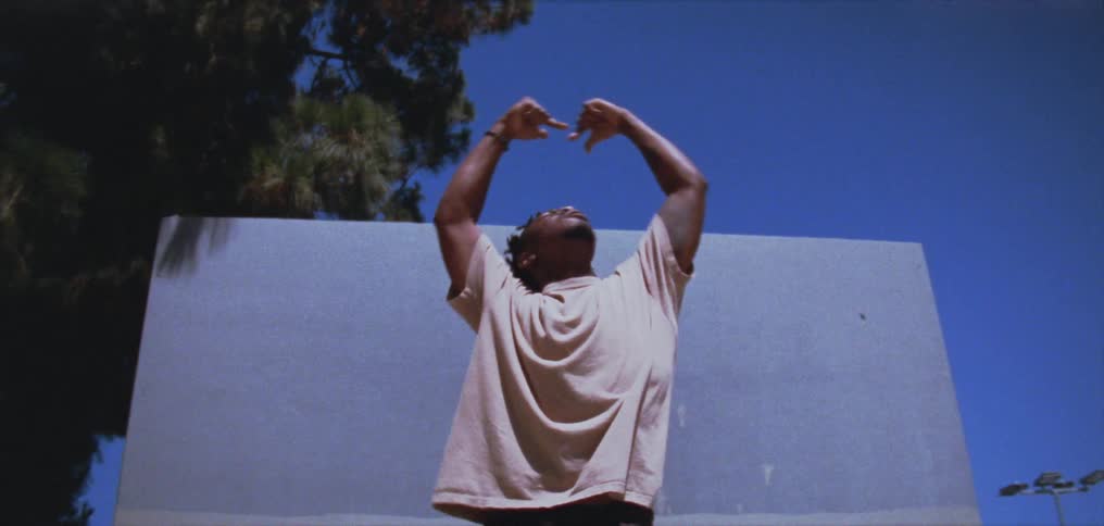 A man is dancing outside