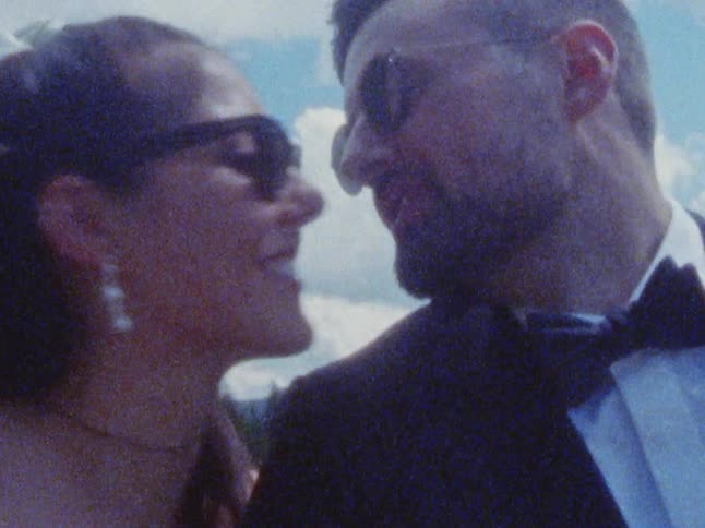 Husband and wife got married outdoors during spring