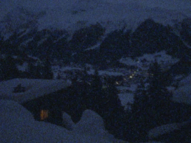 The view is of the cabin in the nature area in the winter time