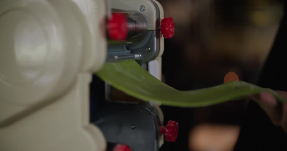 A man putting things through a machine