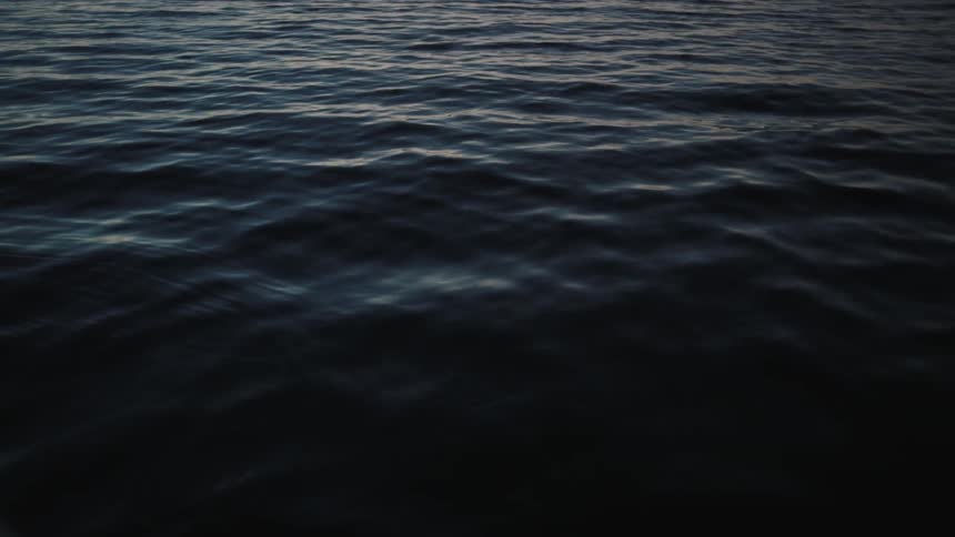 Water slowly rippling on the surface