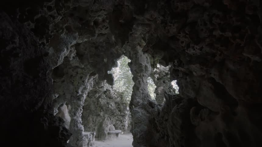 The interior of a cave as it winds toward the cave's opening
