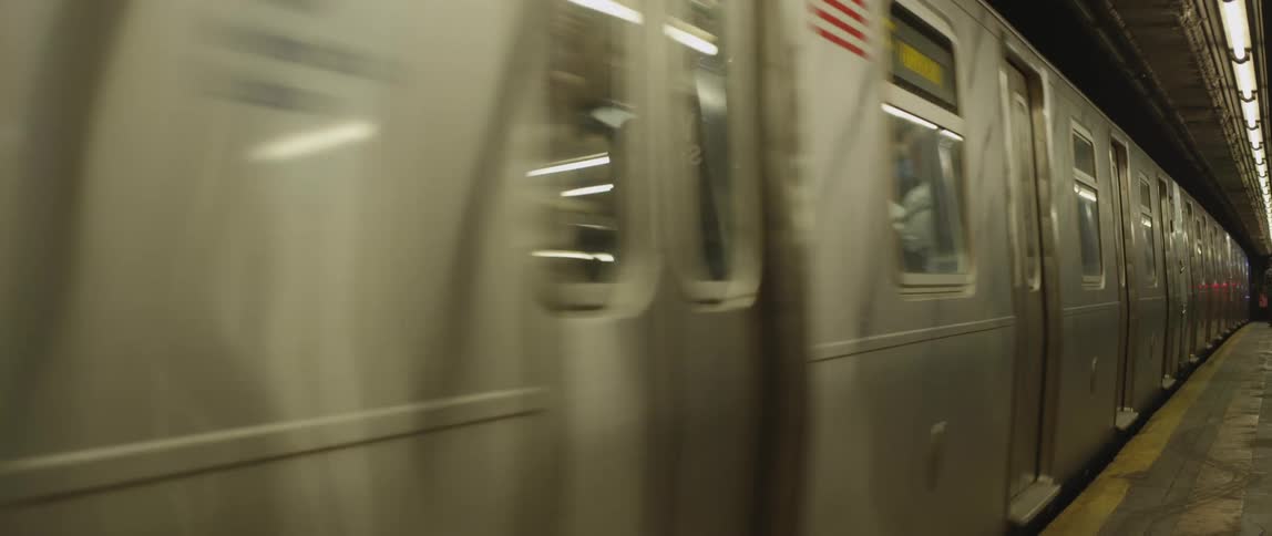 A subway train goes by