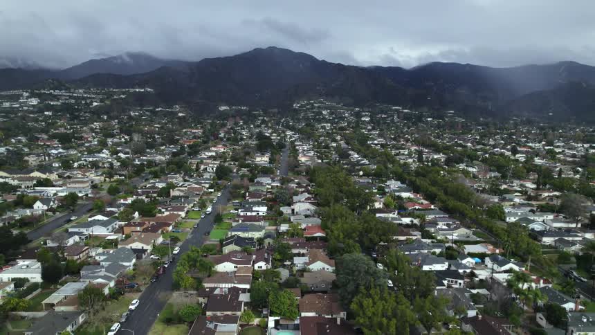 Residential neighborhood with several houses with some mountains in the background