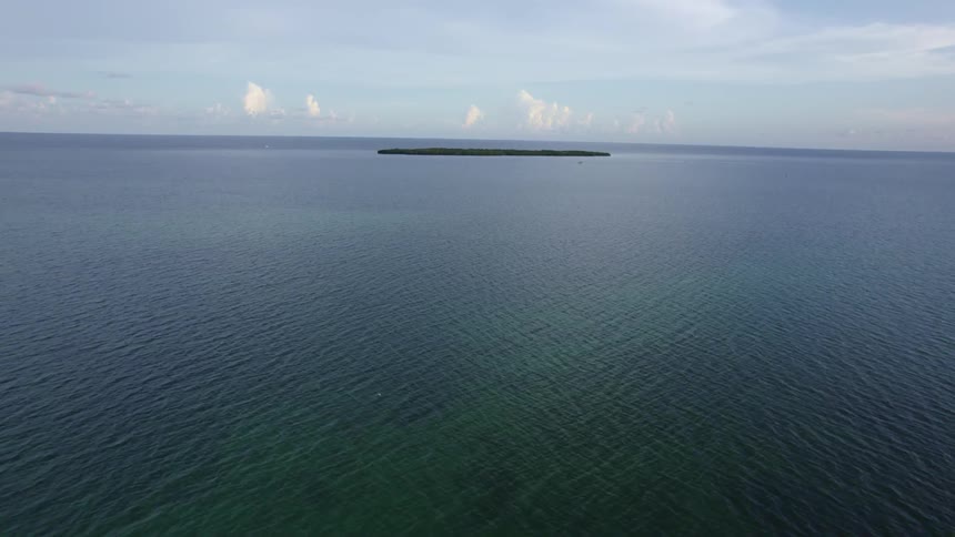 Aerial view of a small island in the middle of the ocean