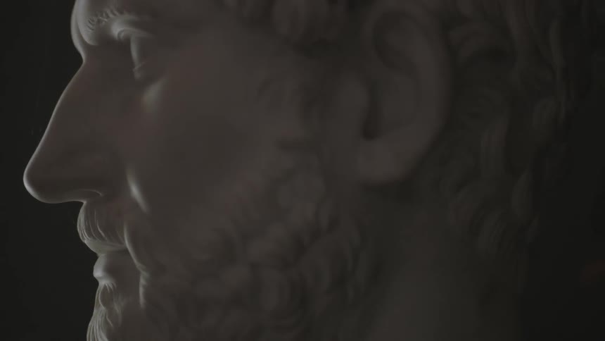 Close-up of a sculpture of a bearded man