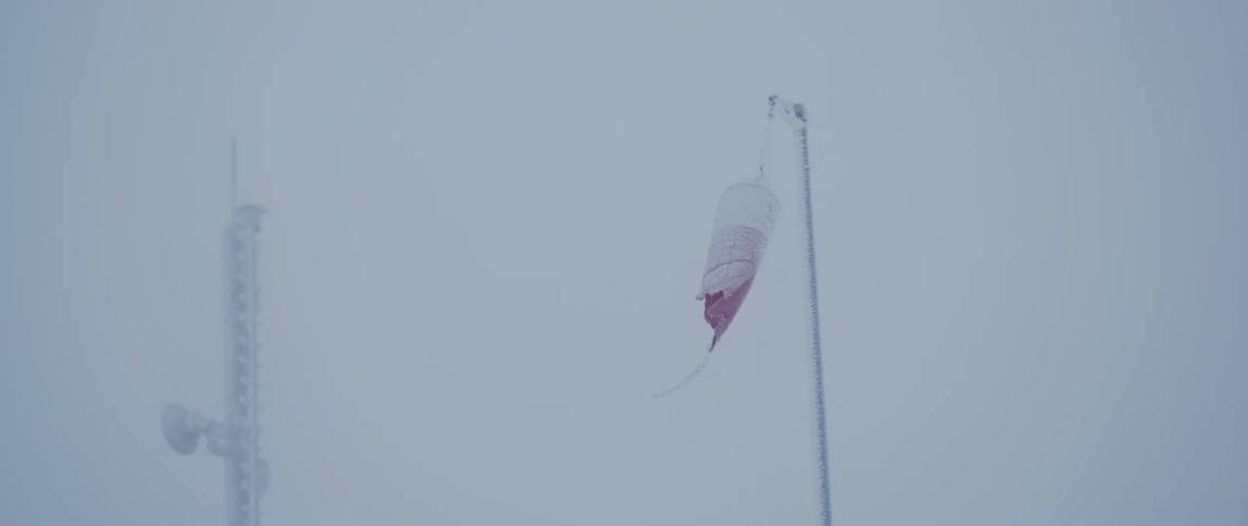 Wind blowing through a windsock during a winter storm