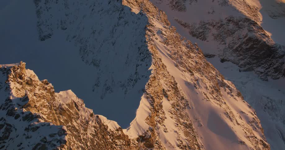 Aerial view of snowy knife edge mountain ridge