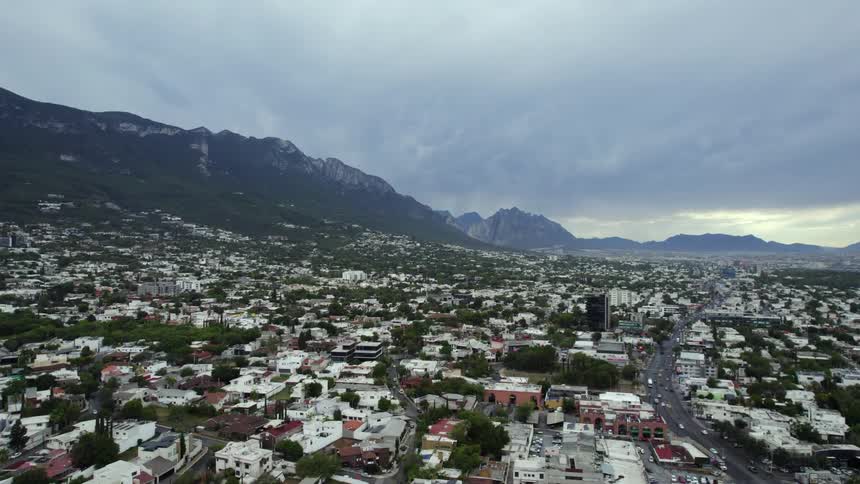 Aerial view of a neighborhood on a small town near the mountains