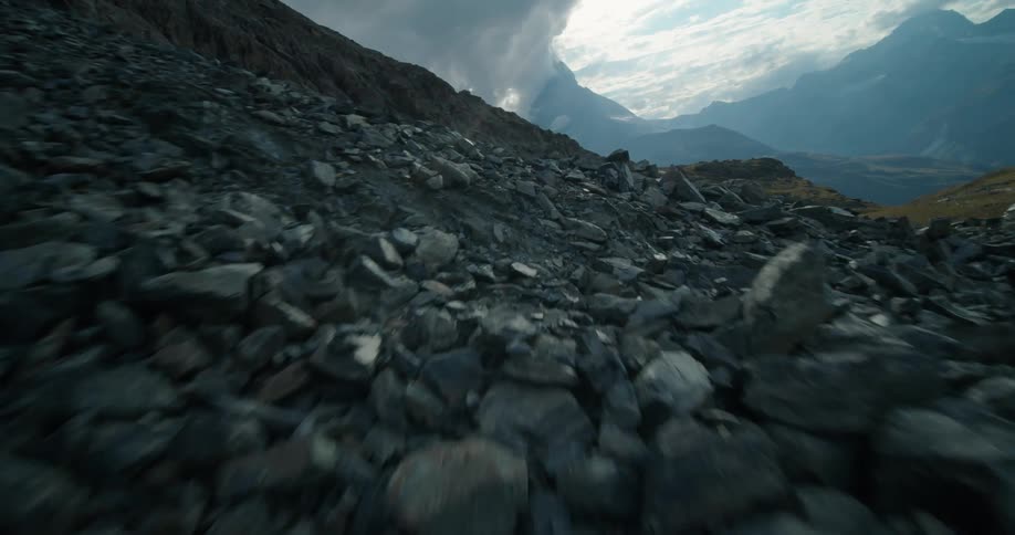 Rocks on a hill next to a river