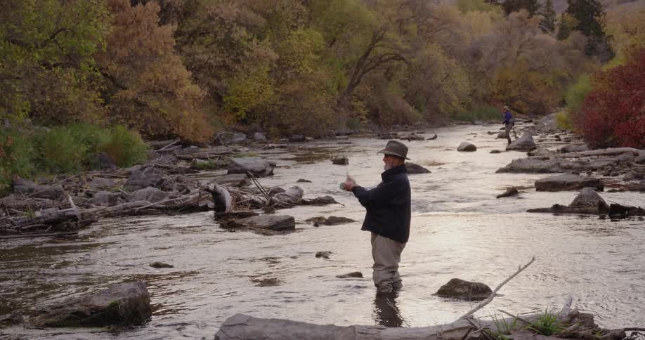 A man is fly fishing
