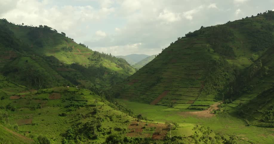 Aerial view of green mountain slopes and valley