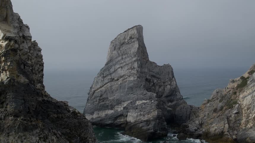 Large rocks cover this shore line