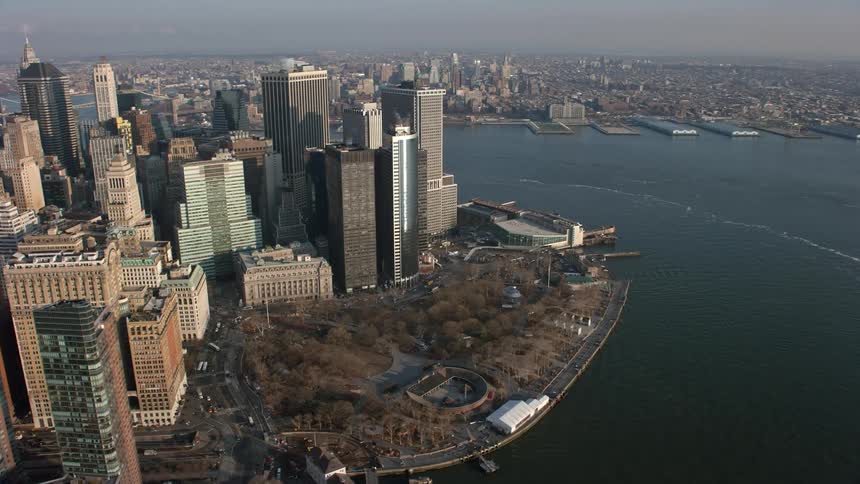 Aerial view of Lower Manhattan skyscrapers and Battery Park during winter in New York City