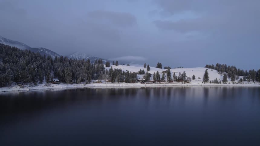 The shore is covered with snow
