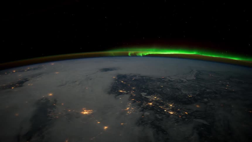 A view of a planet from space is displayed on film