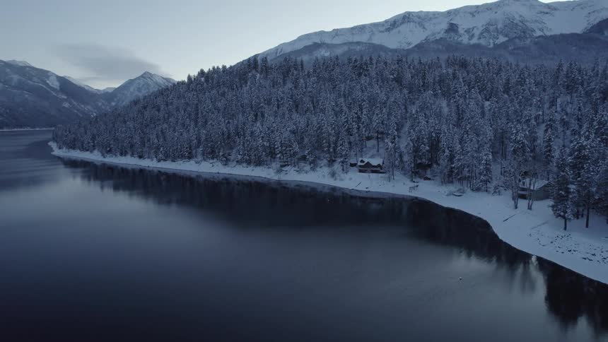 Aerial view of a landscape in winter is displayed