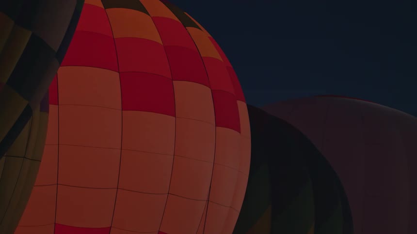 Air balloons are displayed during the night time