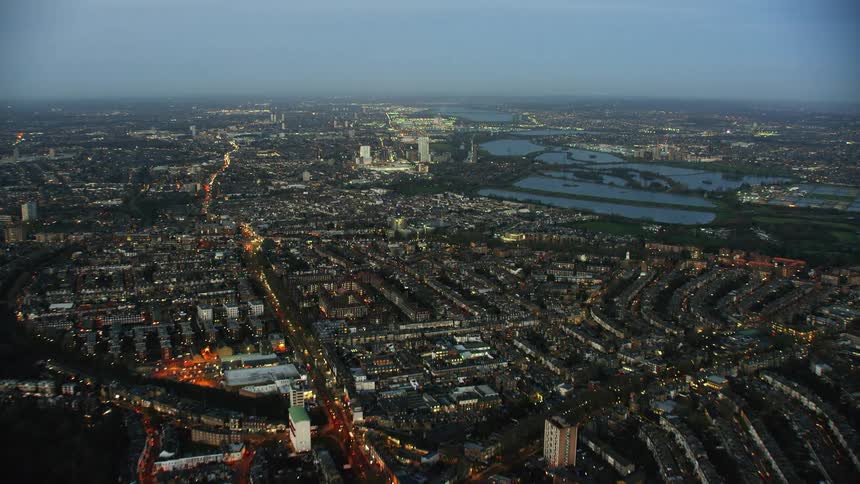 An aerial view of a large city near water