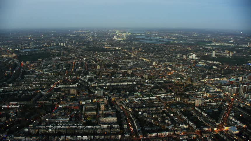 Aerial view of a downtown city is displayed