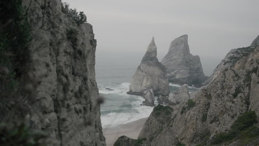 Rock spires on the beach on a cloudy day