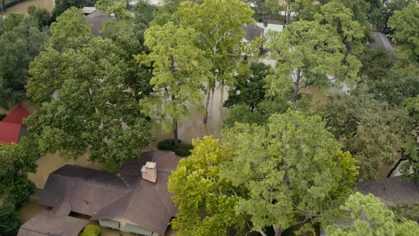 Aerial view of flooded area and submerged houses in flood