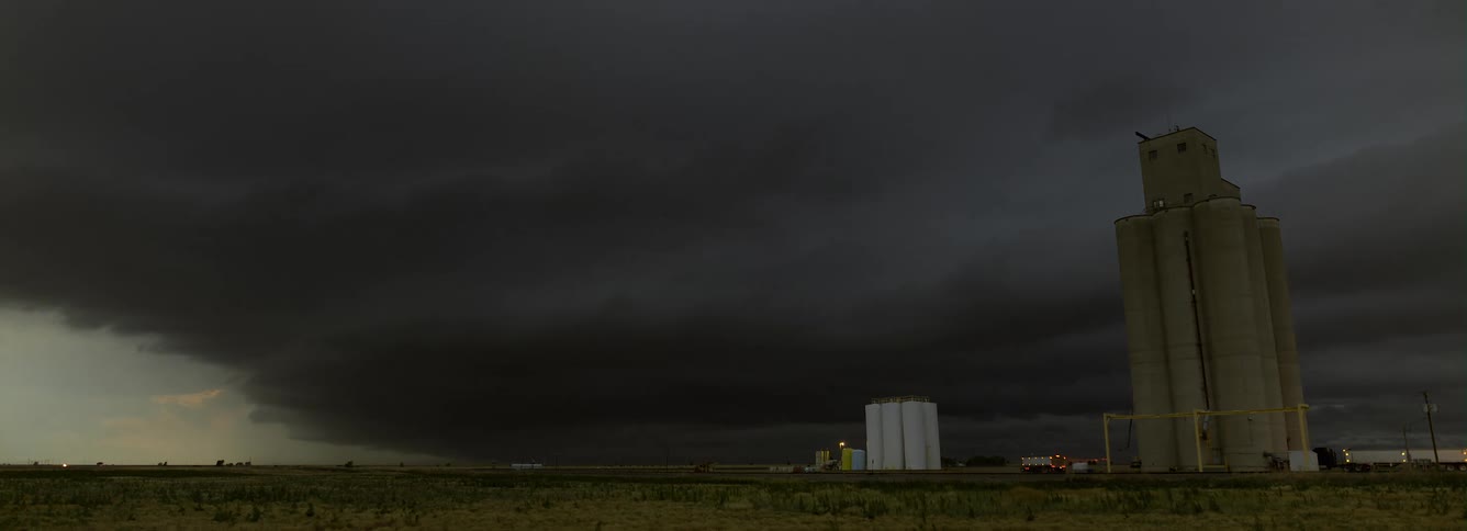 Lightning strikes over a farm