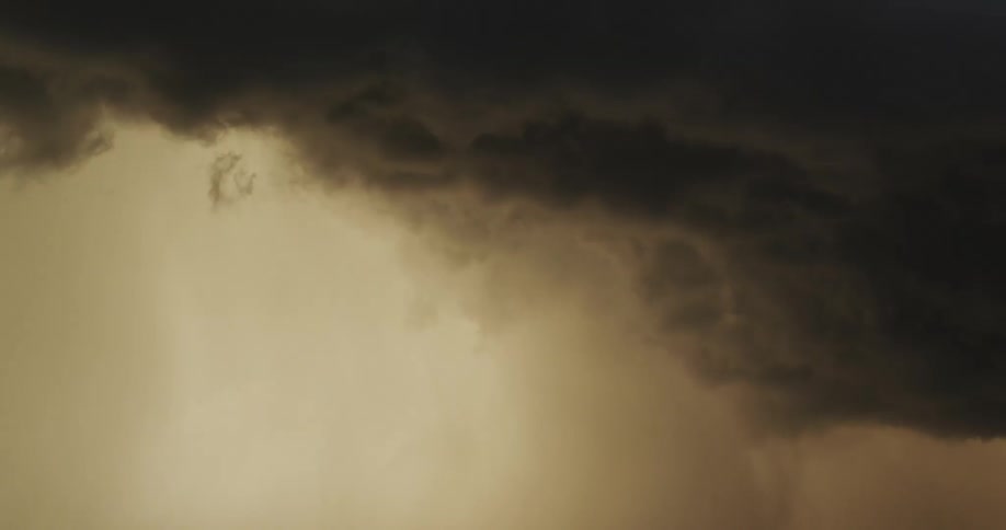 Large dark storm clouds rolling through the sky
