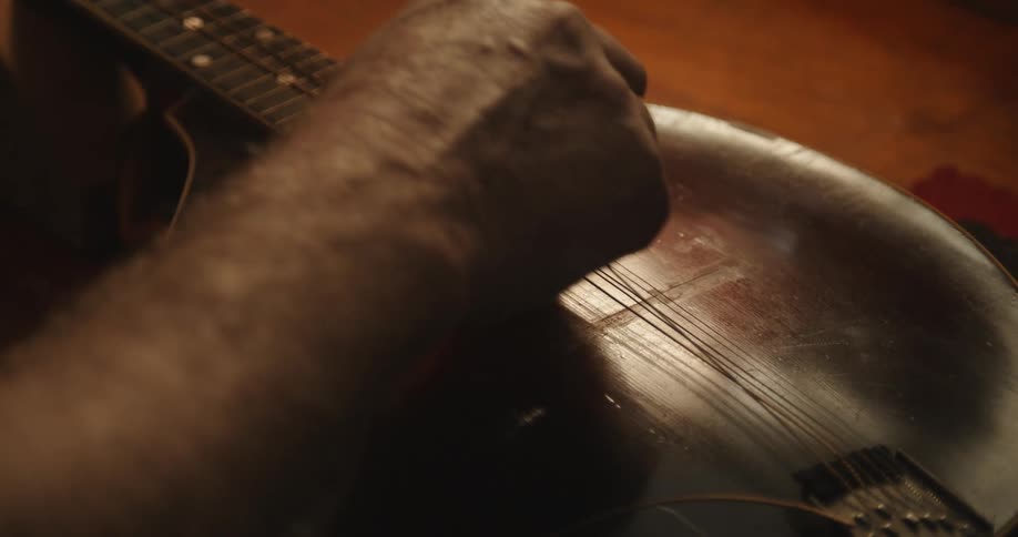 A person is repairing a violin