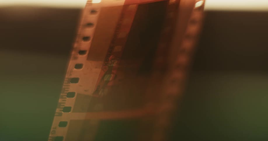 A person puts down a film slide