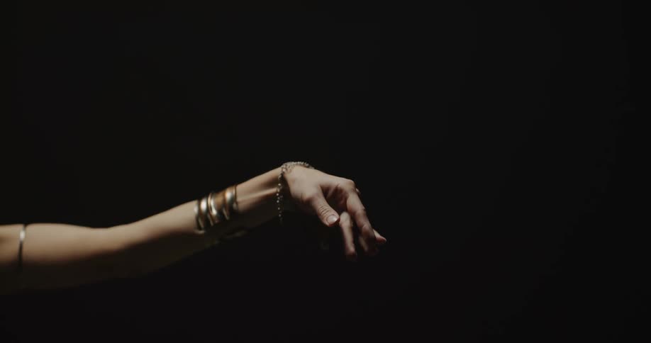 Close up view of a persons arm while dancing