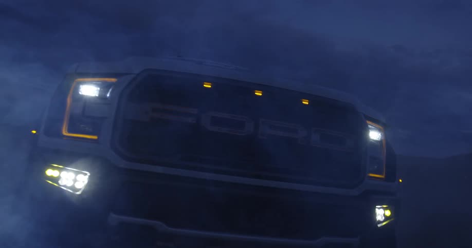 Close up view of a car outdoors during the night time