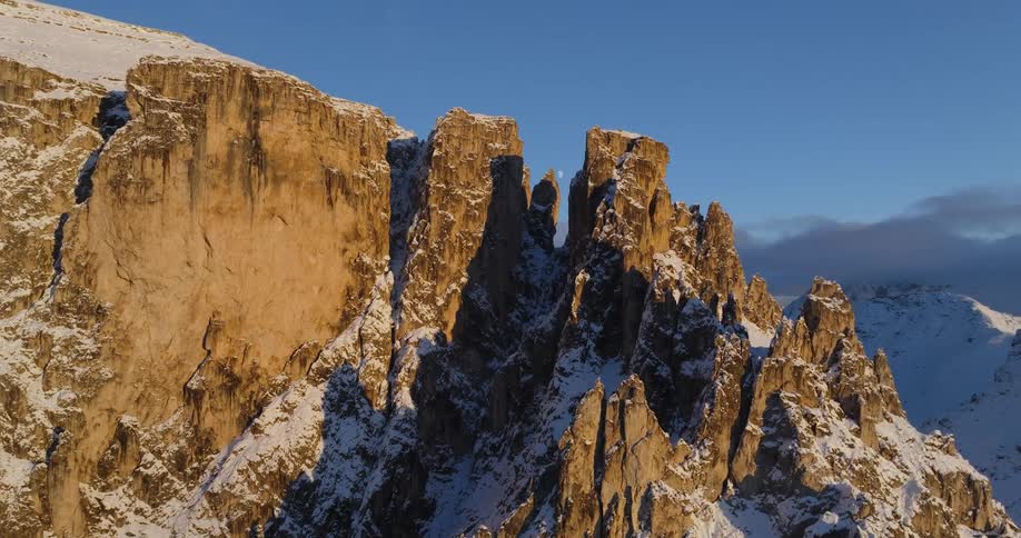 The view is of the mountain located in the middle of the day