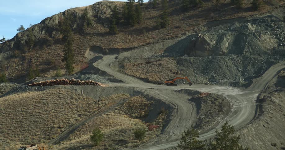Exterior view of worksite with excavator